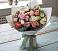 Букет цветов из: Розы, Лизиантусы и Гвоздики в Воронки